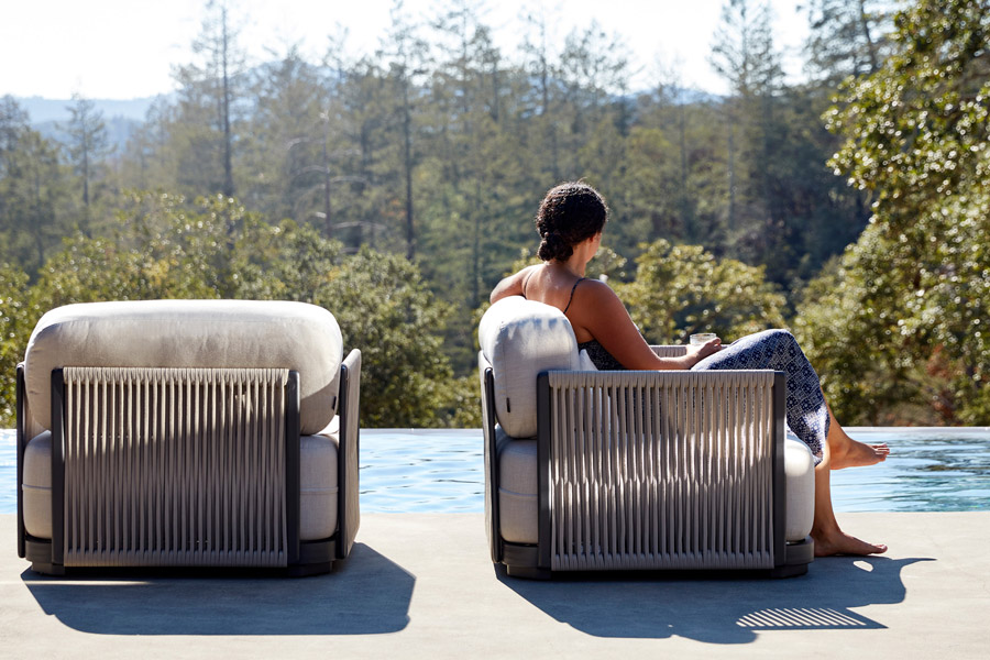 Cambria lounge chairs with woven rope back and side panels