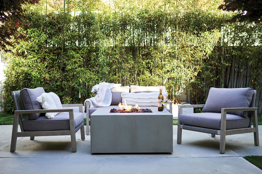 cozy outdoor seating area warmed by fire table