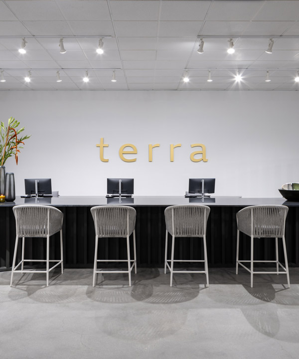 Terra Outdoor checkout area with Olema bar chairs - for mobile display