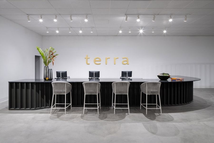Terra Outdoor checkout area with Olema bar chairs