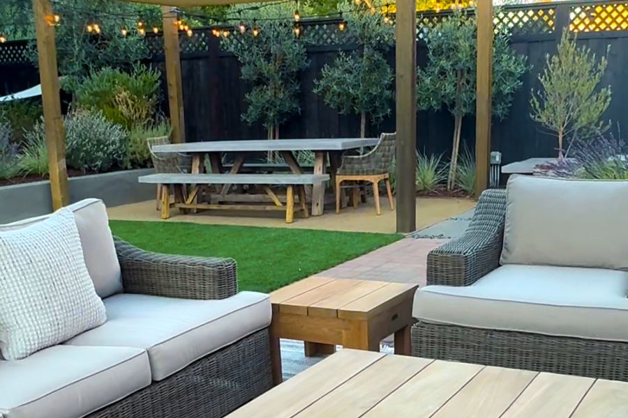 clean and well-maintained outdoor furniture in the backyard of designer Sol Grace Home