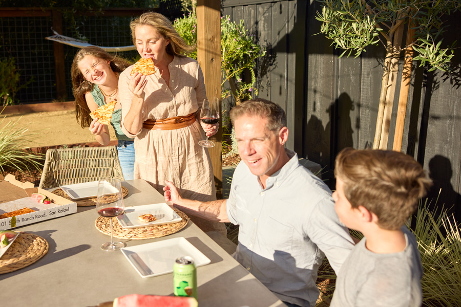 family shot around Bordeaux concrete table