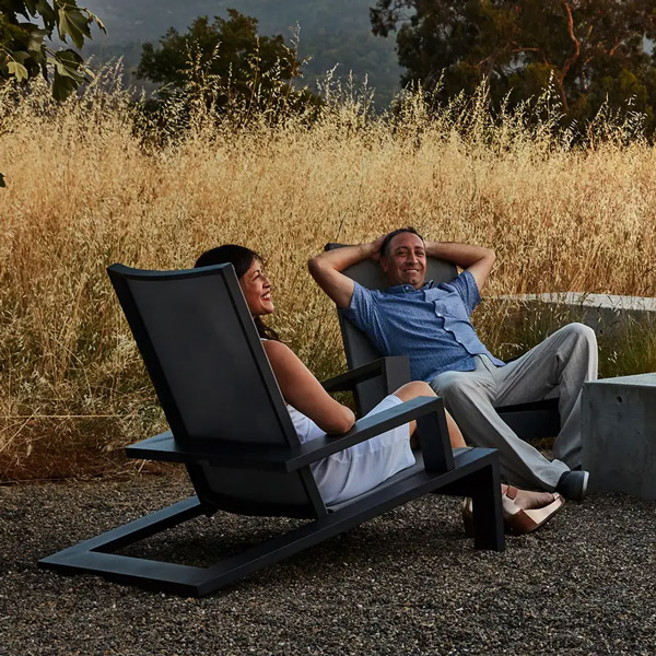 Adirondack outdoor furniture by a fire table