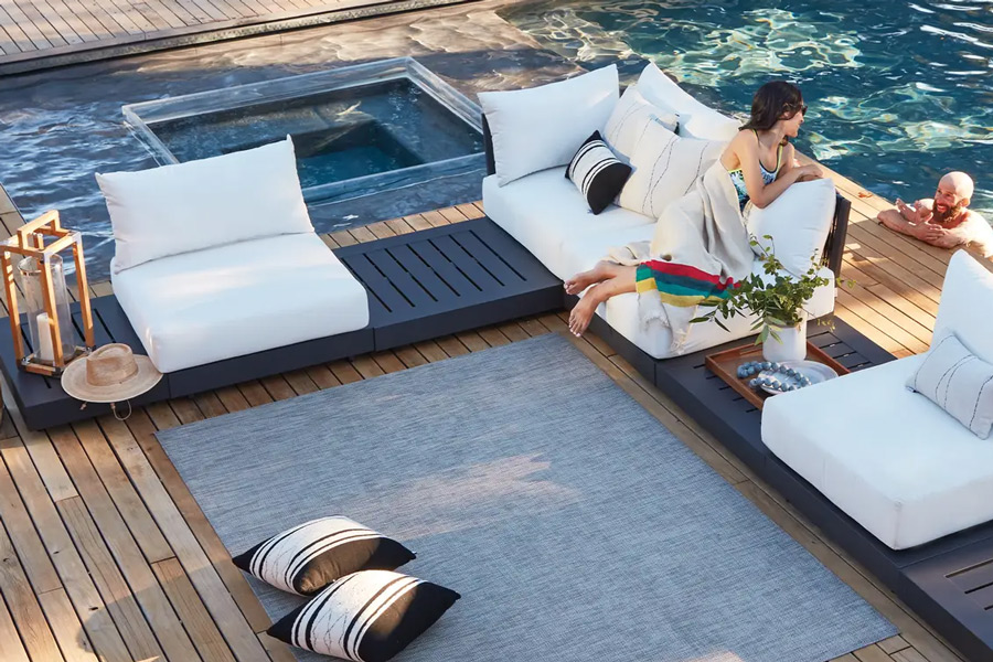 sectional seating with an outdoor rug