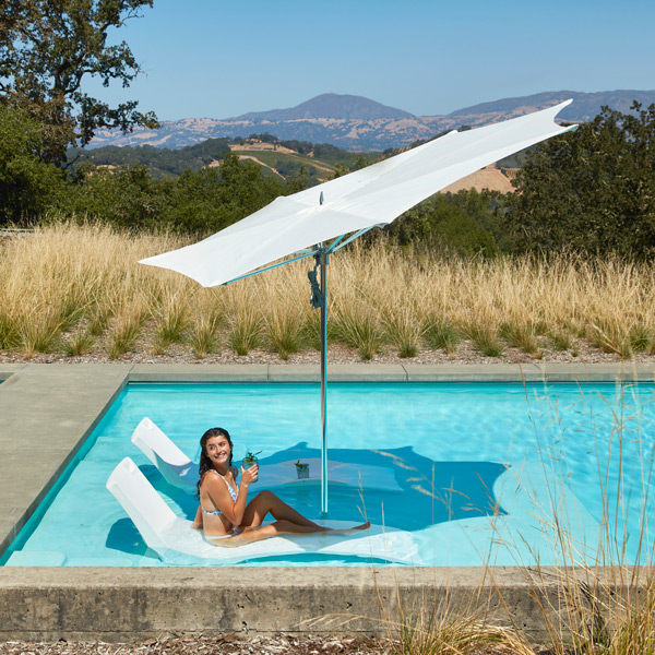 in-pool loungers and luxury umbrella