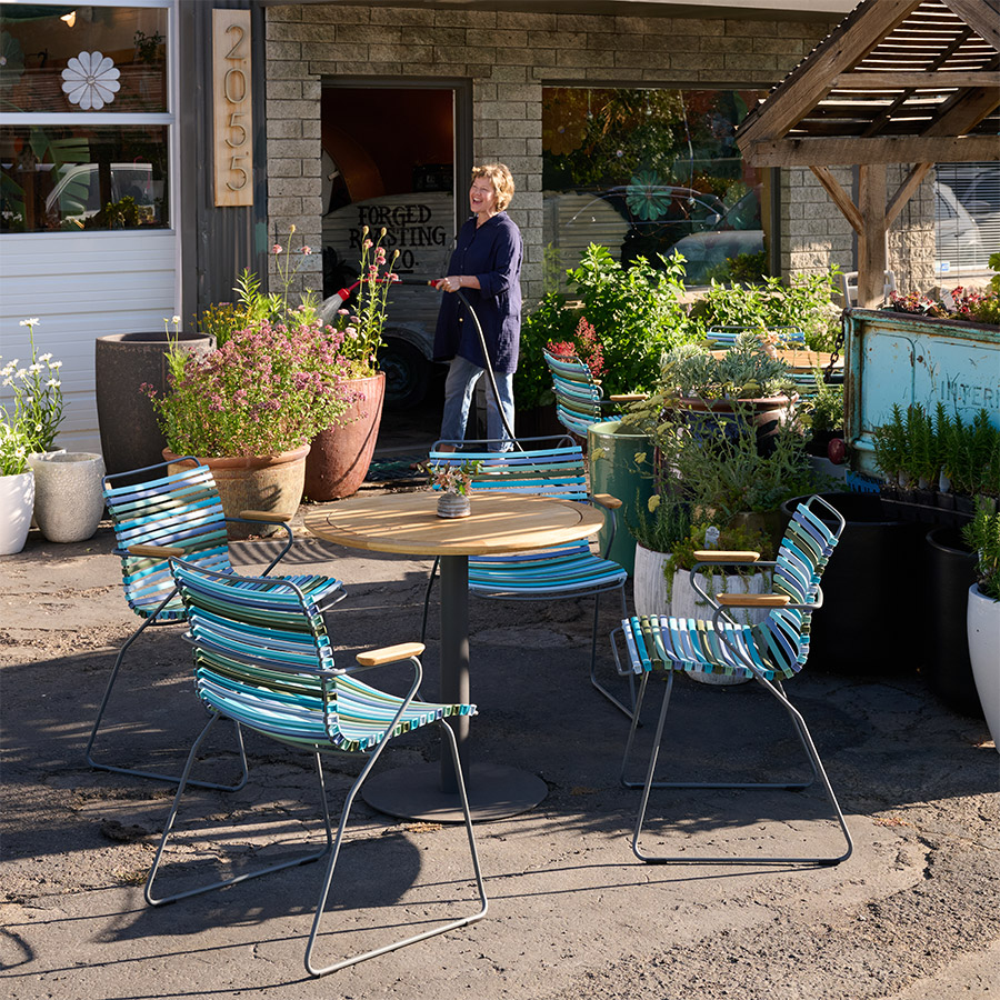 click-outdoor-dining-chairs outdoor view of coffee shop with plants