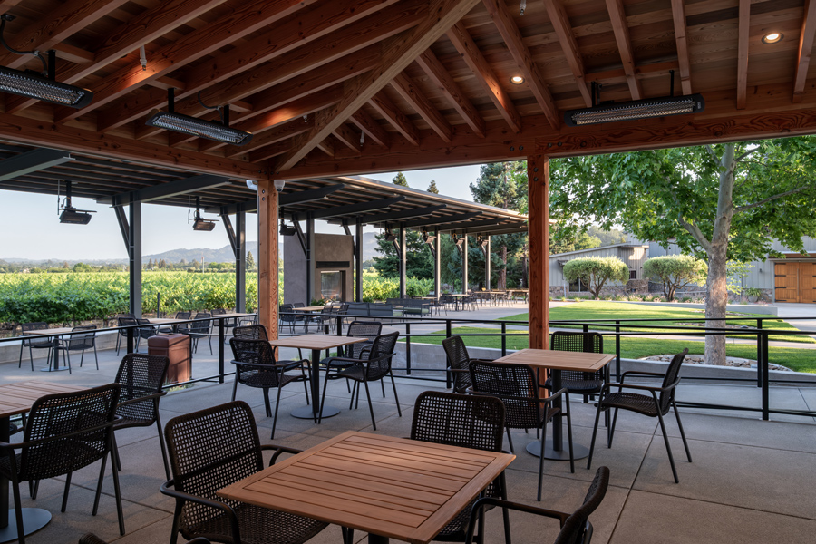 Palm bistro tables and Presidio dining chairs provide Napa winery outdoor seating