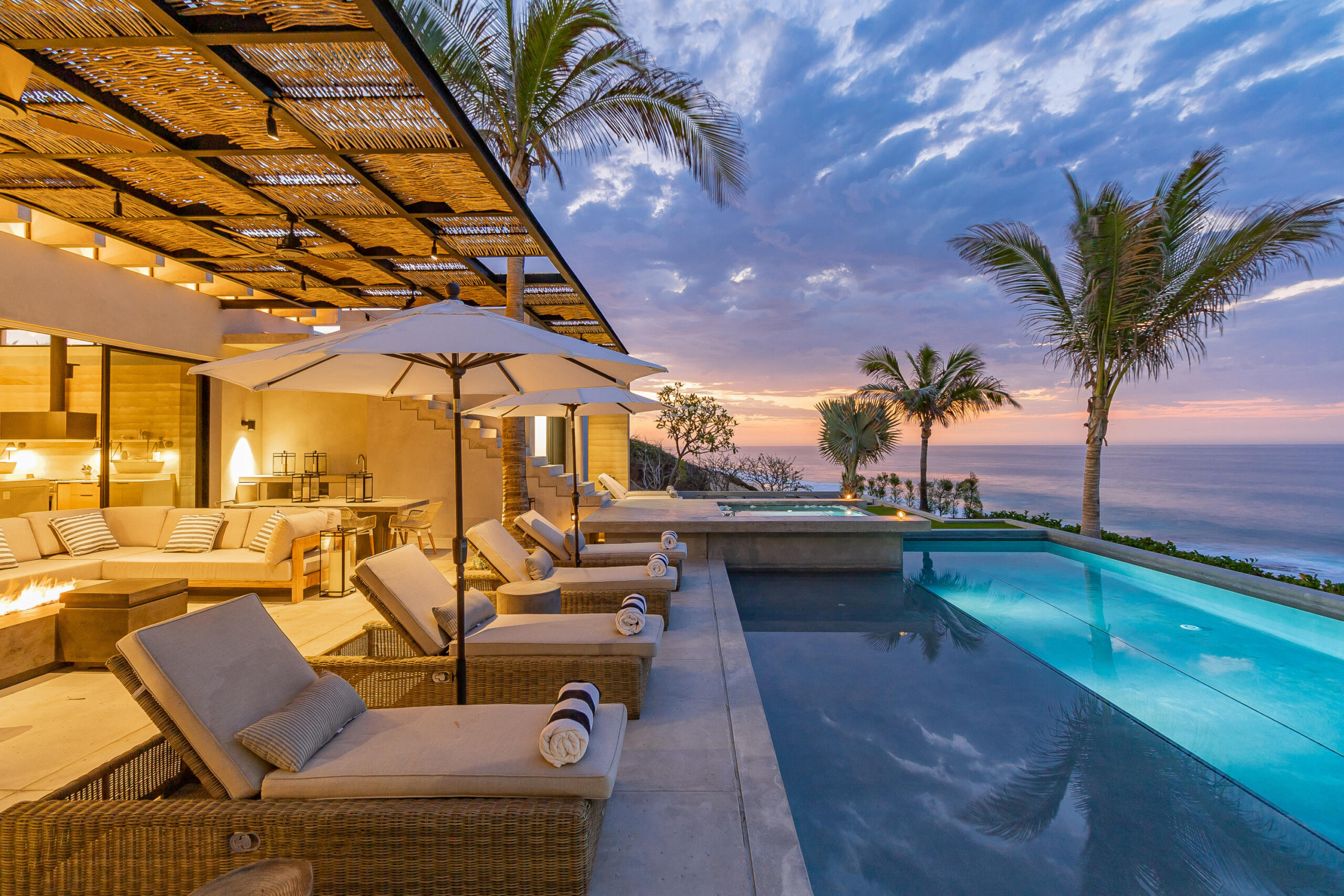 Sausalito chaises poolside with a beautiful poolside Pacific Ocean sunset